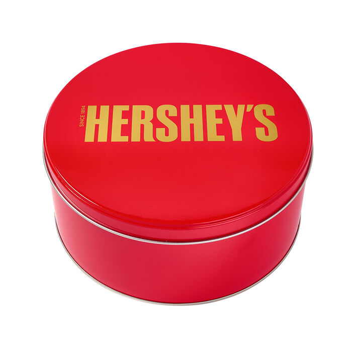 Image of HERSHEY'S KISSES Trio Variety Filled Holiday Red Gift Tin, 2.25 lb Packaging