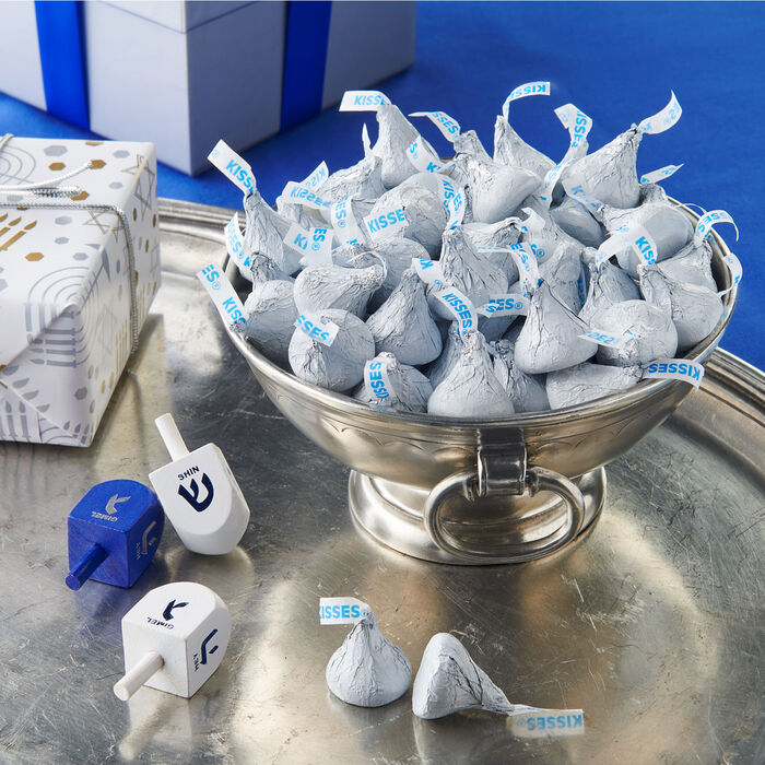 Image of HERSHEY'S KISSES Milk Chocolates in White Foils - 66.7oz Candy Bag Packaging