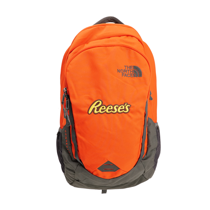Image of Orange North Face Back Pack with the REESE'S Logo Packaging