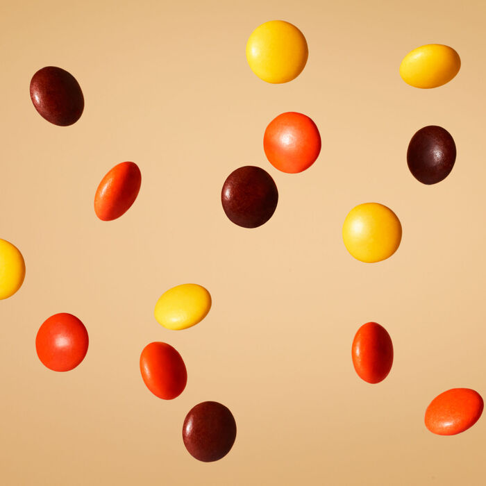Image of REESE'S PIECES Peanut Butter in a Crunchy Shell, Christmas , Candy Plastic Cane, 1.4 oz Packaging
