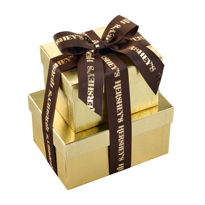 Image of HERSHEY'S Caramels and Milk Chocolate Toffee Truffles Gold Gift Tower Packaging