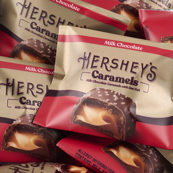 Image of HERSHEY'S Caramels and Milk Chocolate Toffee Truffles Gold Gift Tower Packaging