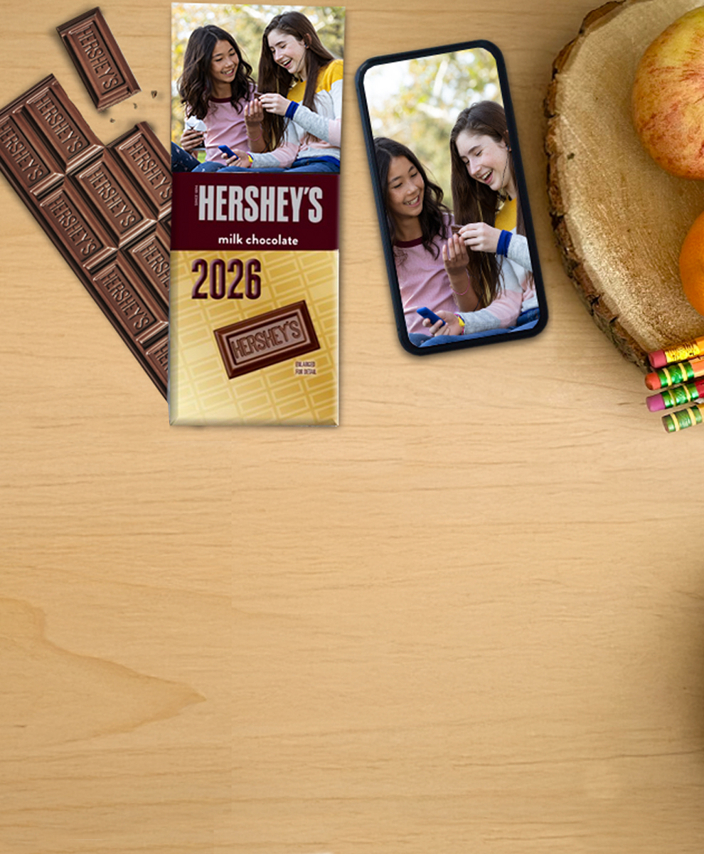 HERSHEY'S Bar with chocolate pieces for back to school sitting on a teacher desk