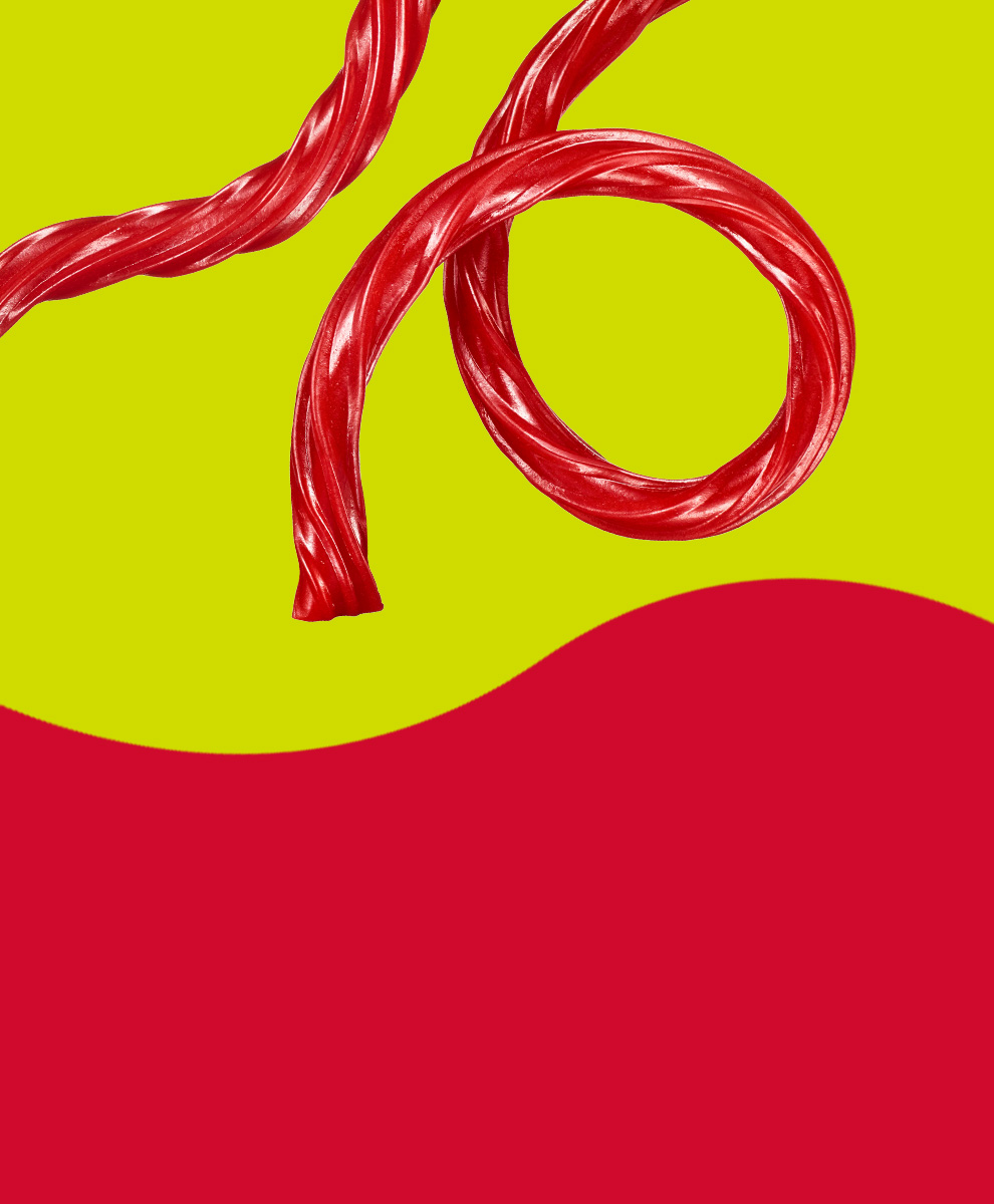 TWIZZLERS twist candy on a red and yellow background