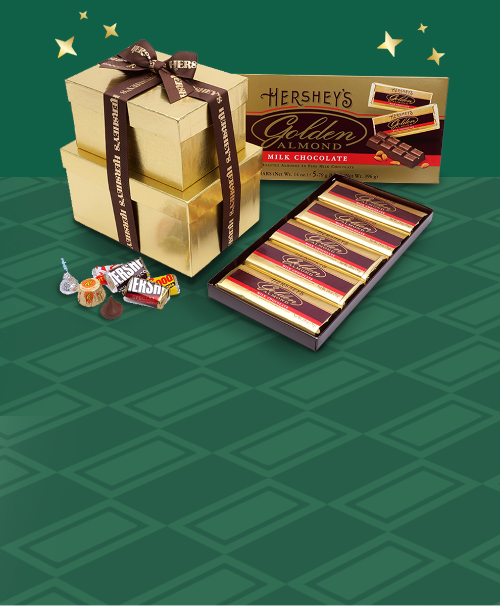 Wrapped chocolate gifts from Hershey on festive green background