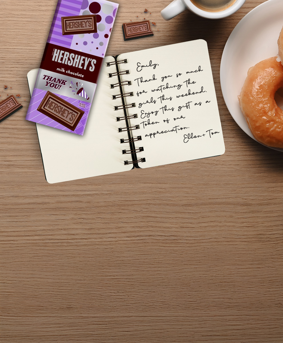 HERSHEY'S Bar with thank you-themed personalized wrapper on a wooden tabletop