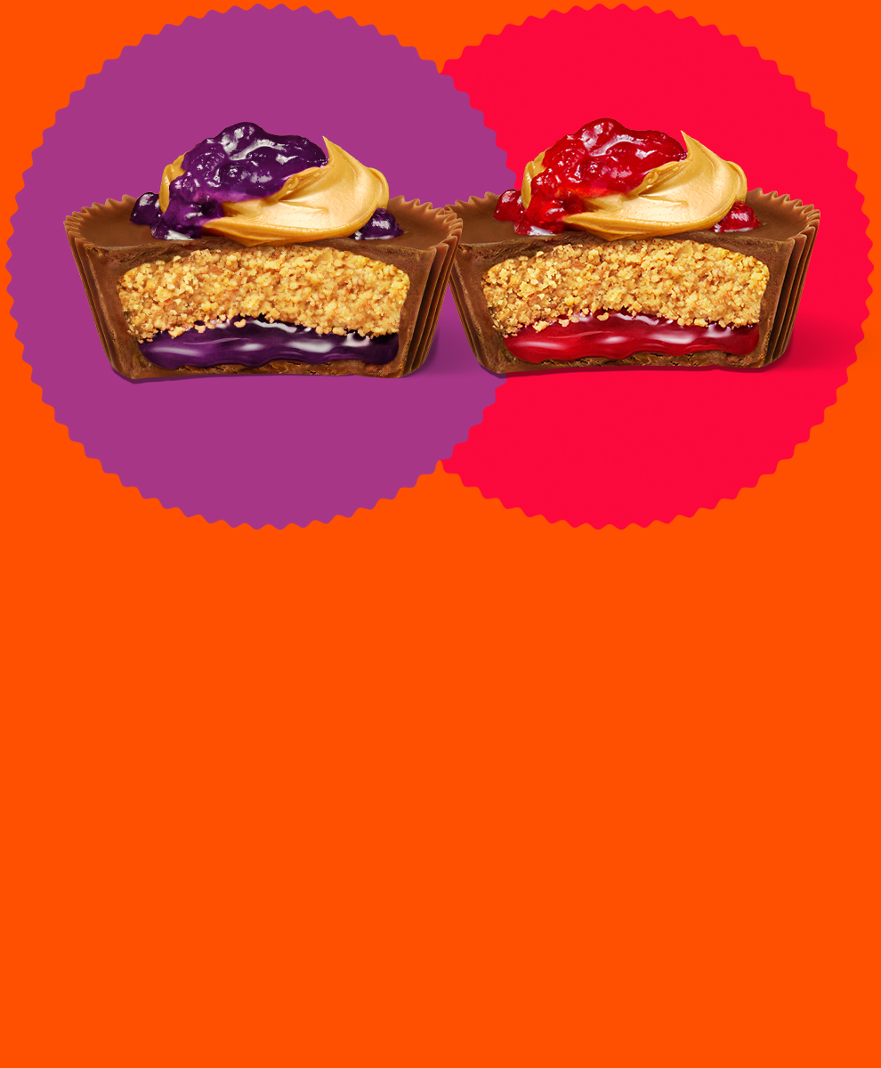 REESE'S Peanut Butter Big Cups with Grape and Strawberry Jelly Filling on an orange background