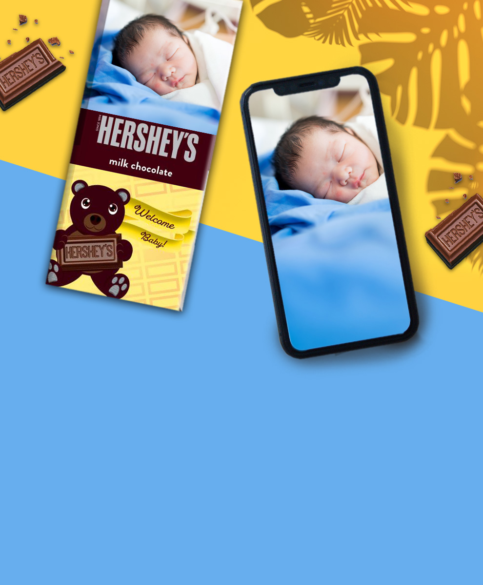 HERSHEY'S Bar with thank you-themed personalized wrapper on a wooden tabletop