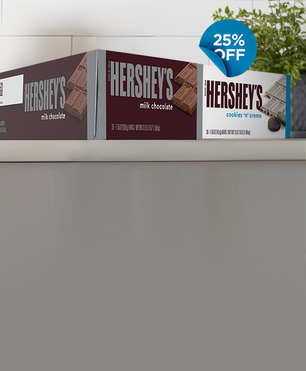 HERSHEY'S Cookies and Cream and Milk Chocolate 36-count bar boxes on a shelf