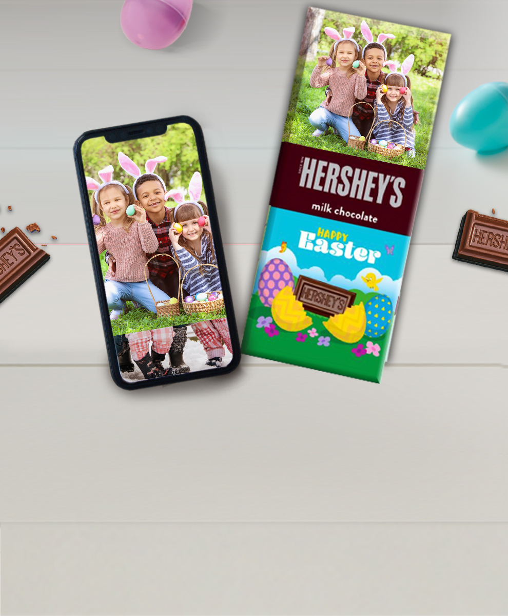 HERSHEY'S Bar with Easter-themed wrapper next to an iPhone