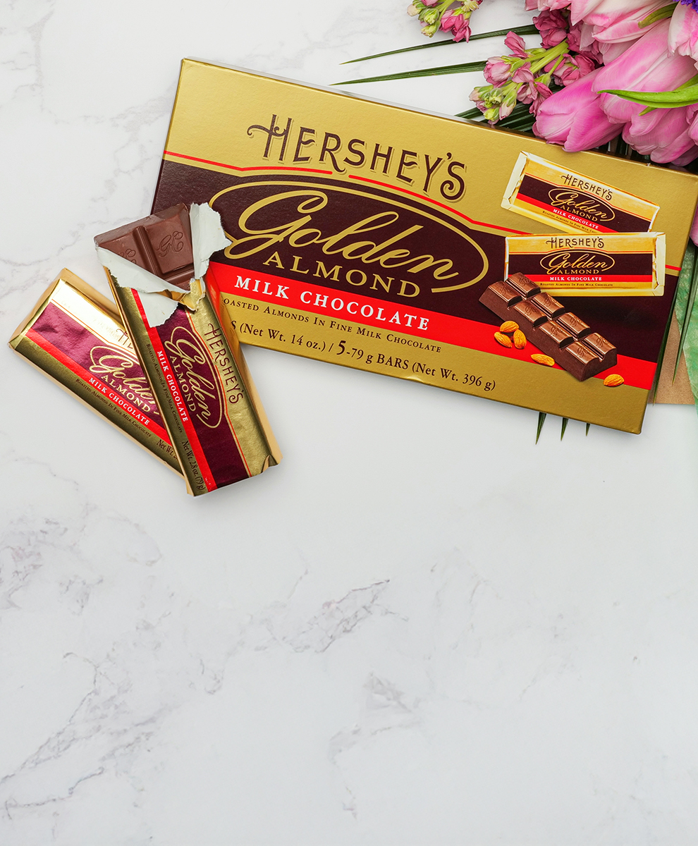 Promotional graphic featuring Hershey's and Reese's Treats in a gift tin