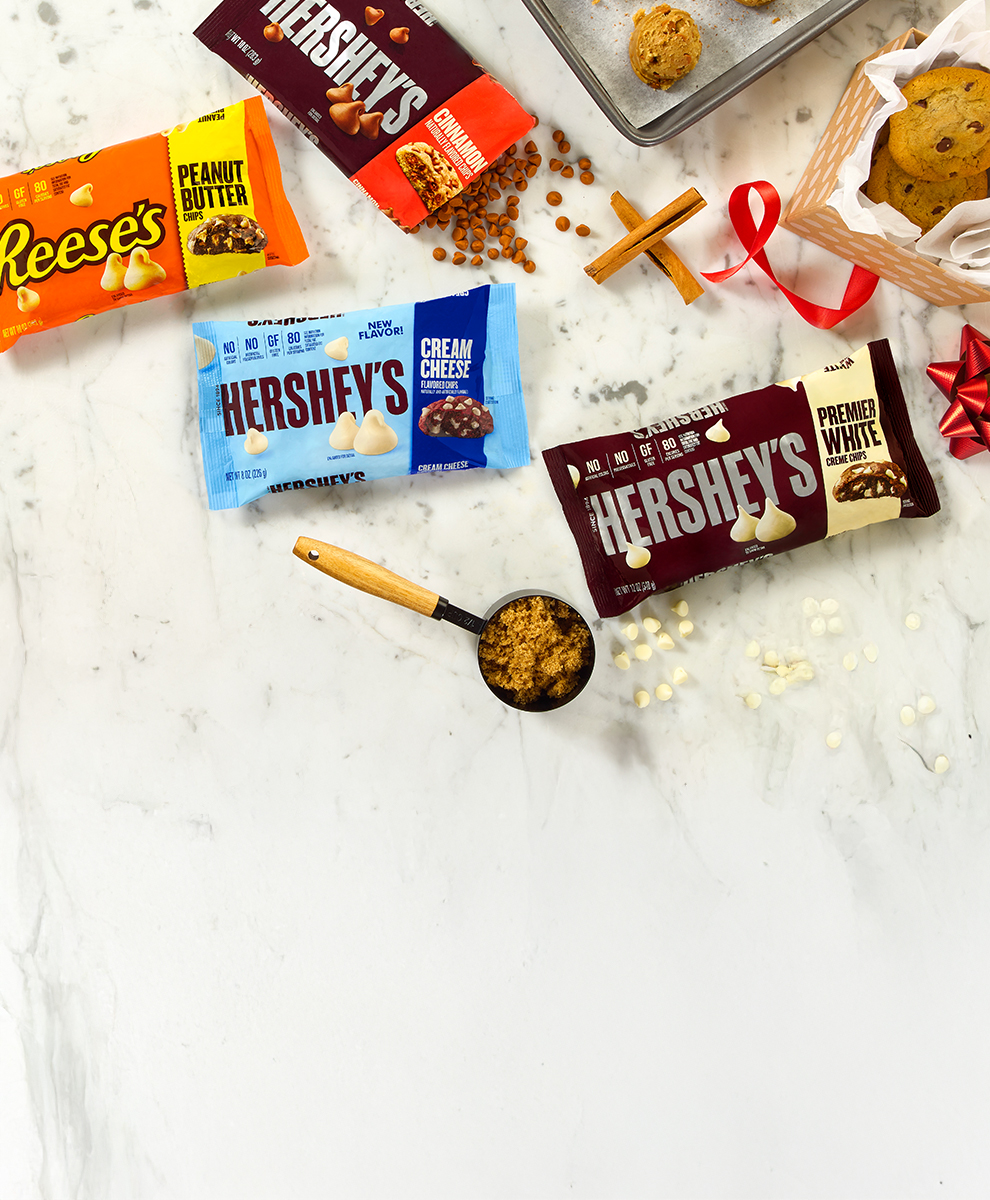 HERSHEY'S and REESE'S baking chips in a kitchen baking scene