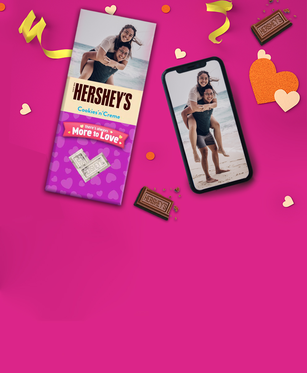 Valentine-themed Personalized HERSHEY'S Bar next to smartphone