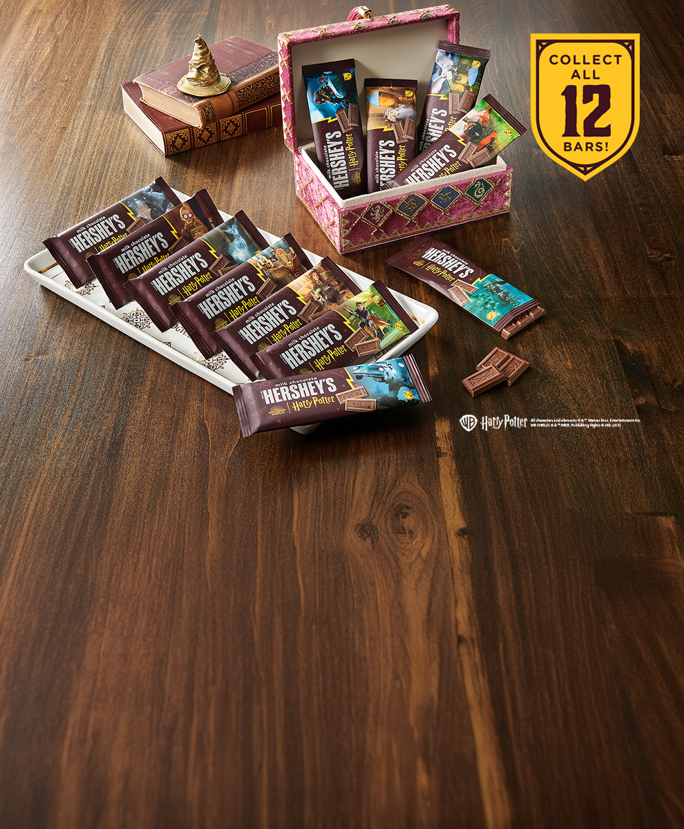 Promotional graphic showing HERSHEY'S Harry Potter™ chocolate bars on a serving tray