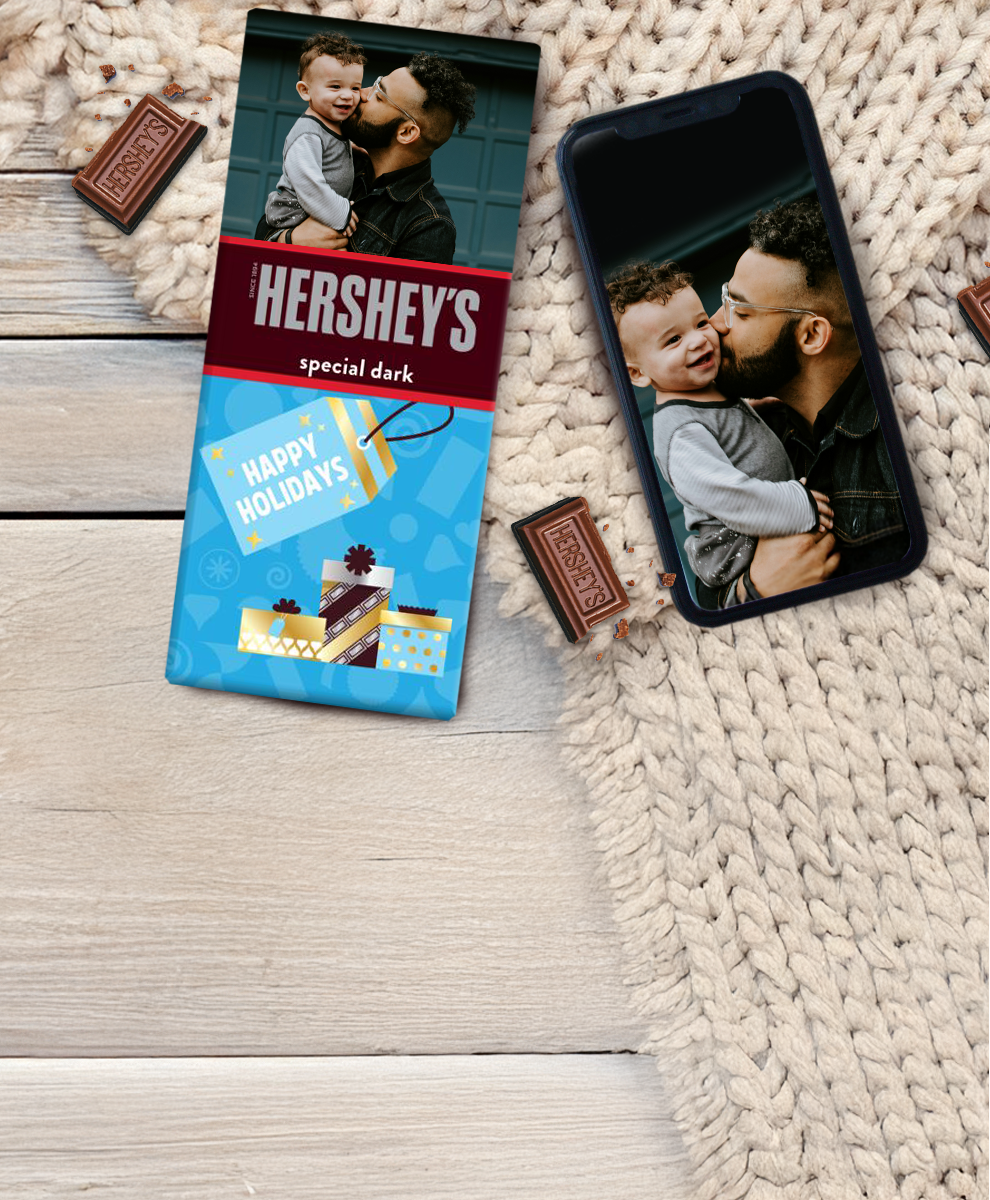 HERSHEY'S Bar with winter-themed personalized wrapper and iPhone background