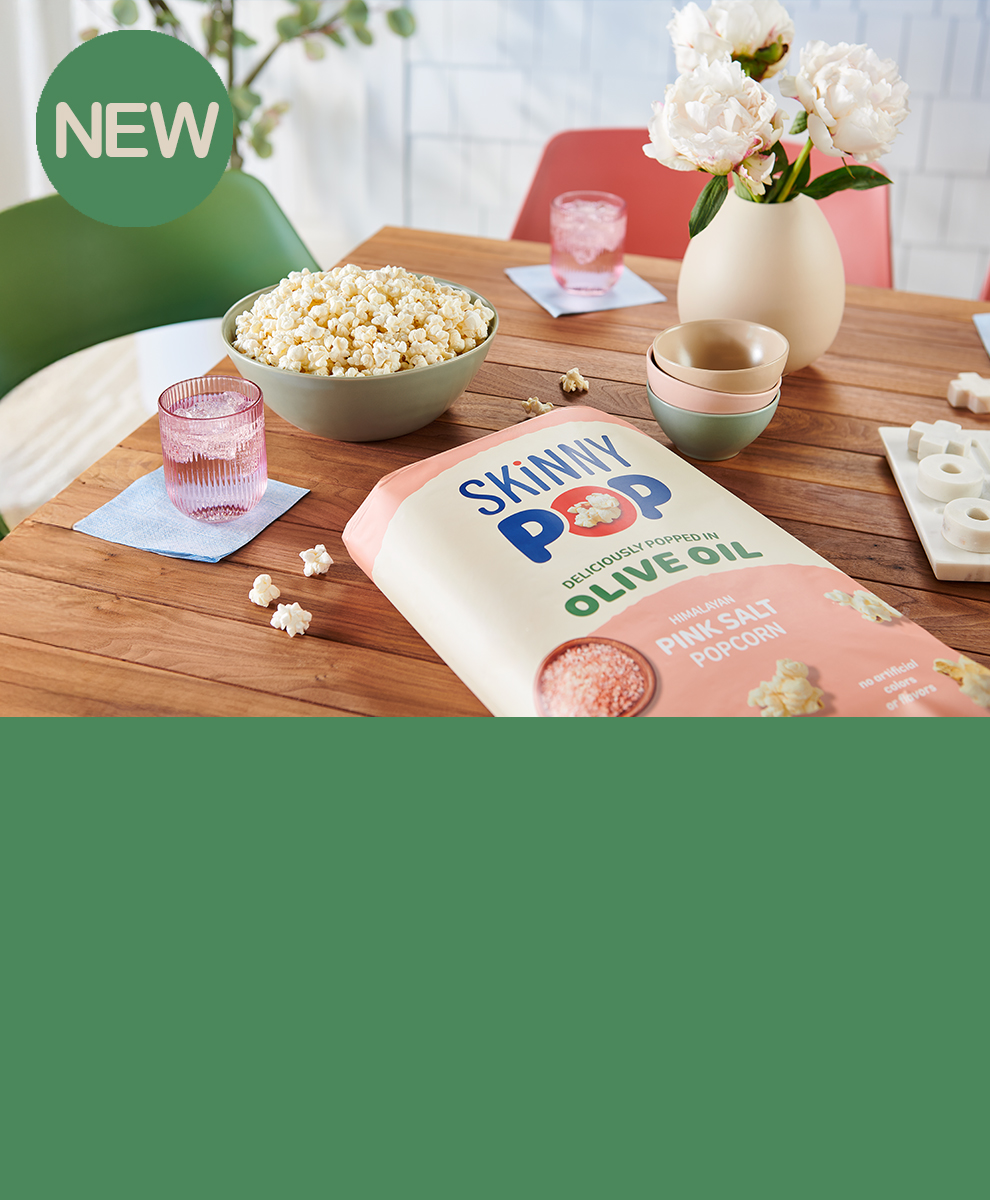 Promotional graphic featuring SKINNY POP Olive Oil Popcorn in a bowl on a table