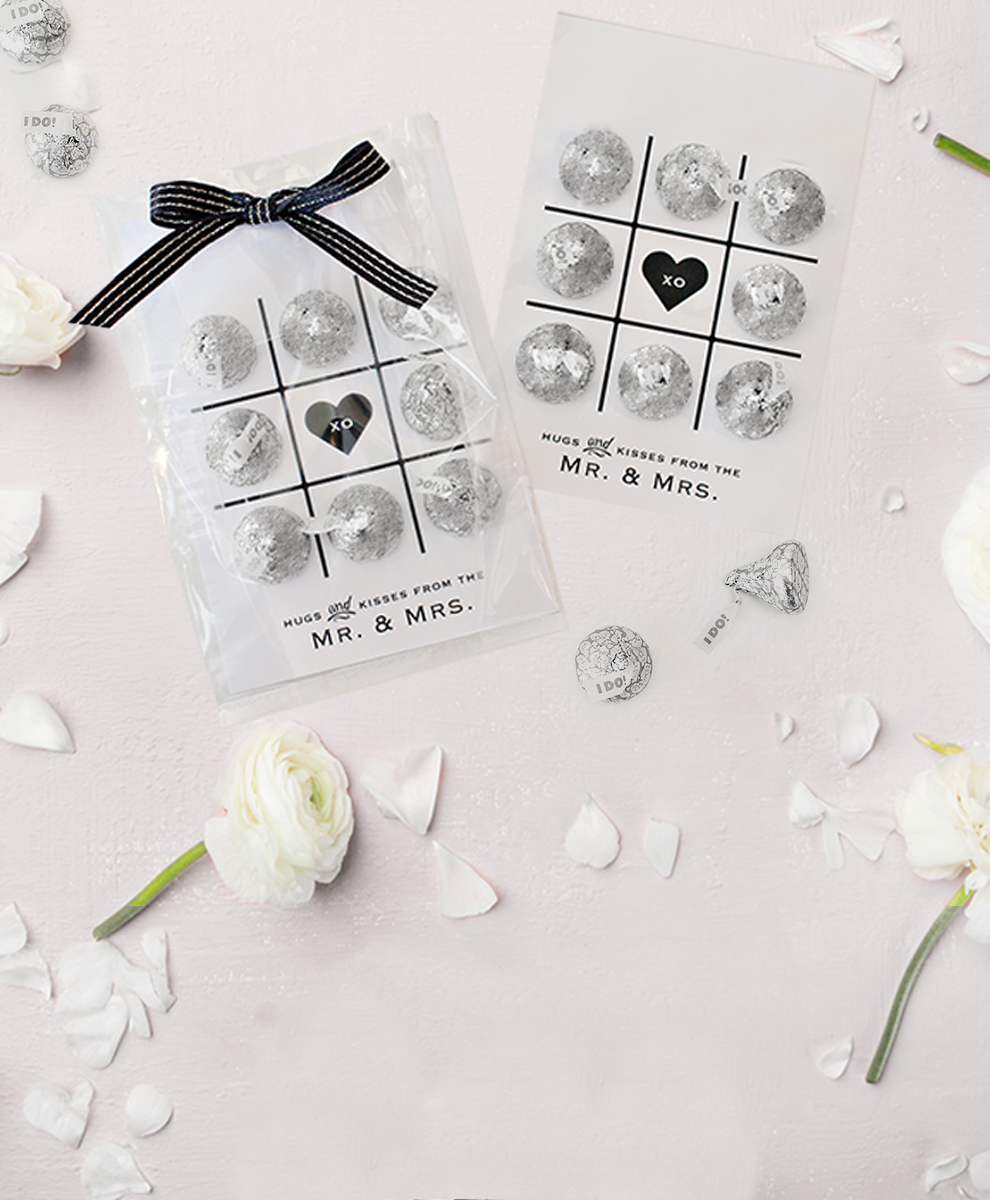Silver-wrapped HERSHEY'S KISSES in 2 tic-tac-toe wedding favor designs