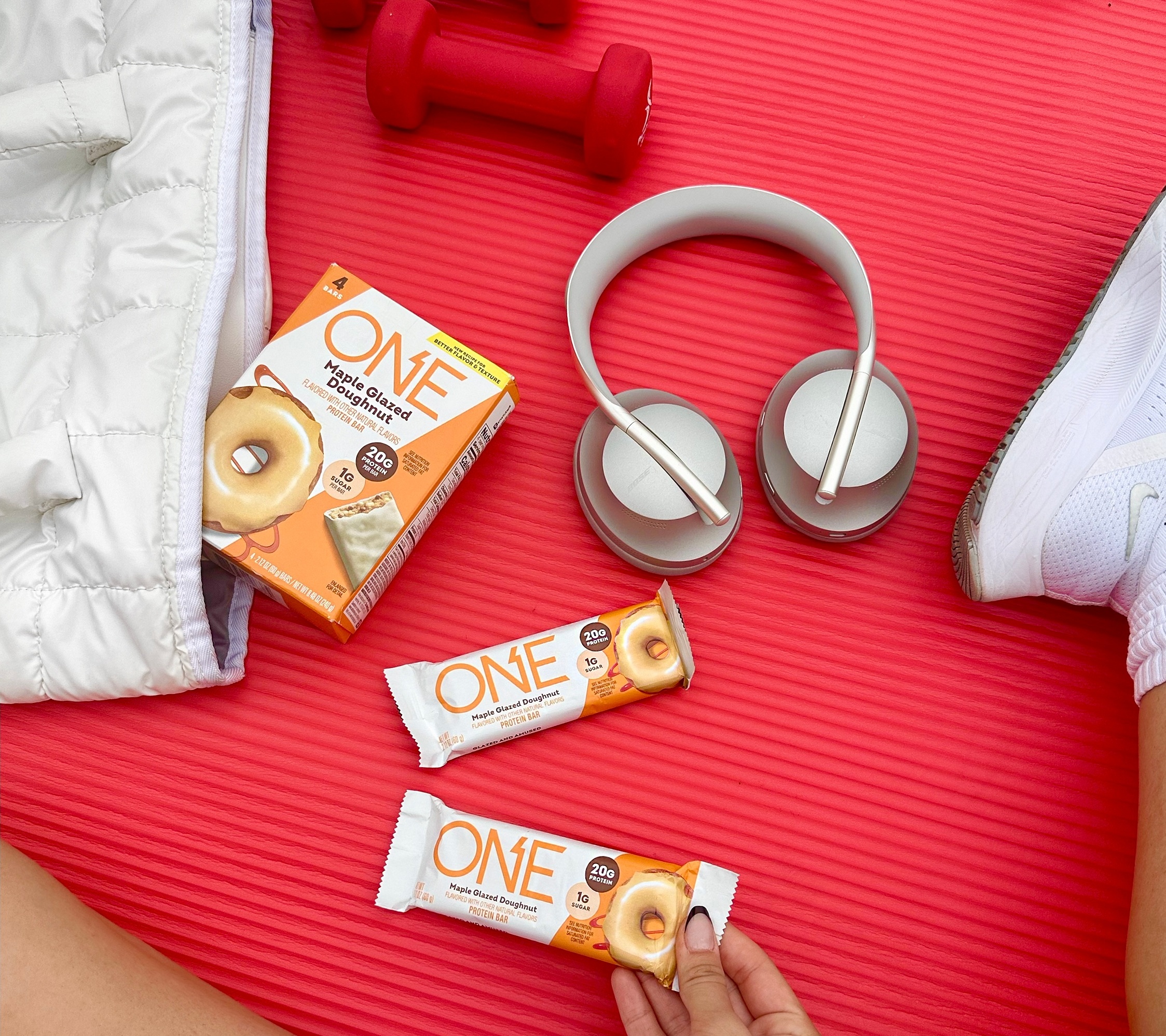 Promotional graphic featuring HERSHEY'S One Protein Bars in Glazed Donut Flavor 