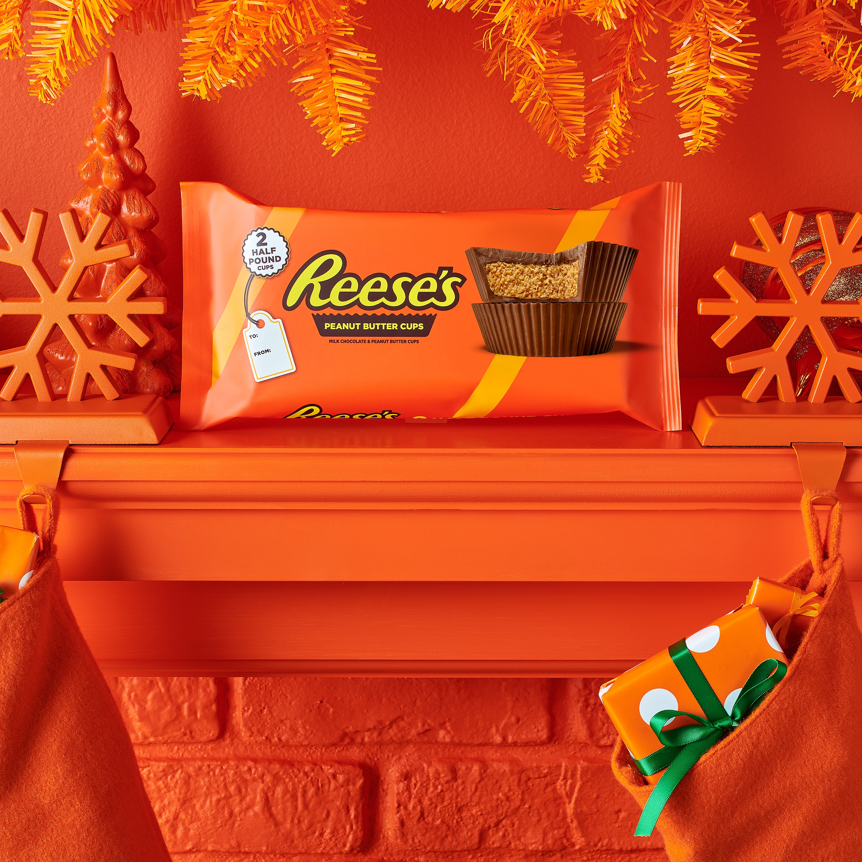 REESE'S World's Largest Cups Candy Pack sitting on a mantel