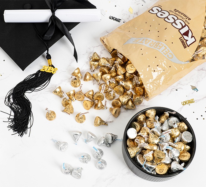 Hershey's Milk Chocolate Kisses in gold and silver foils for graduation party