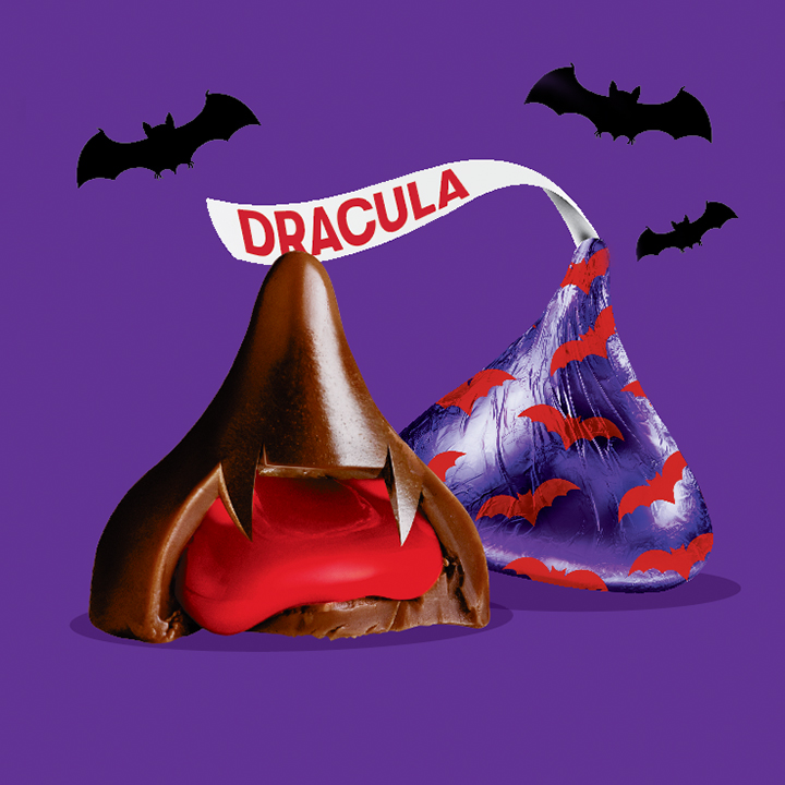 HERSHEY’S KISSES Halloween Vampire chocolates on purple background