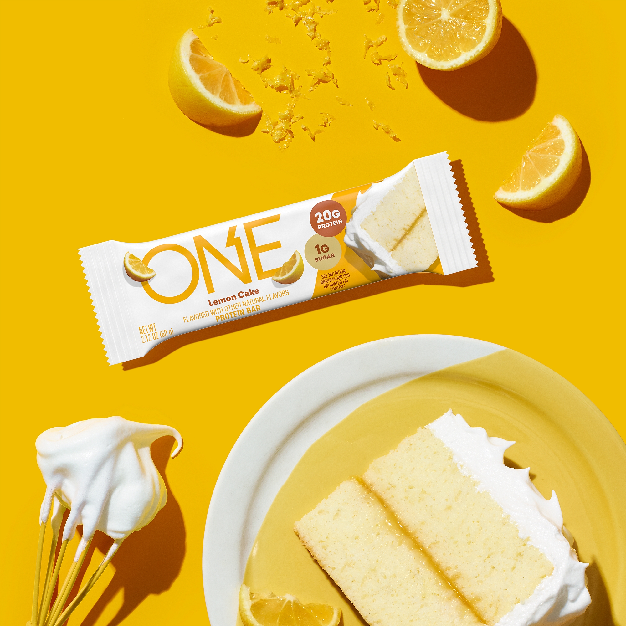 Promotional graphic featuring a Lemon Cake flavored ONE Brand protein bar